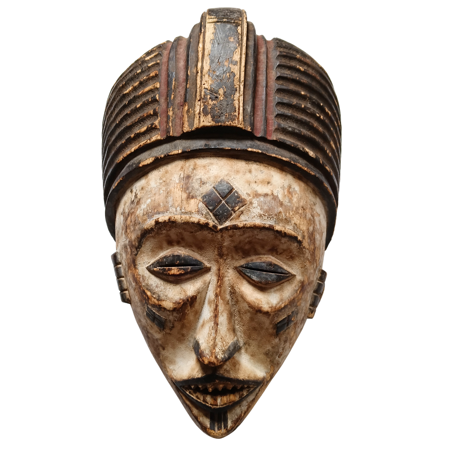 An African wooden mask with a weathered beige and brown finish, featuring a ribbed crown and dark painted details on the eyes, nose, and forehead.