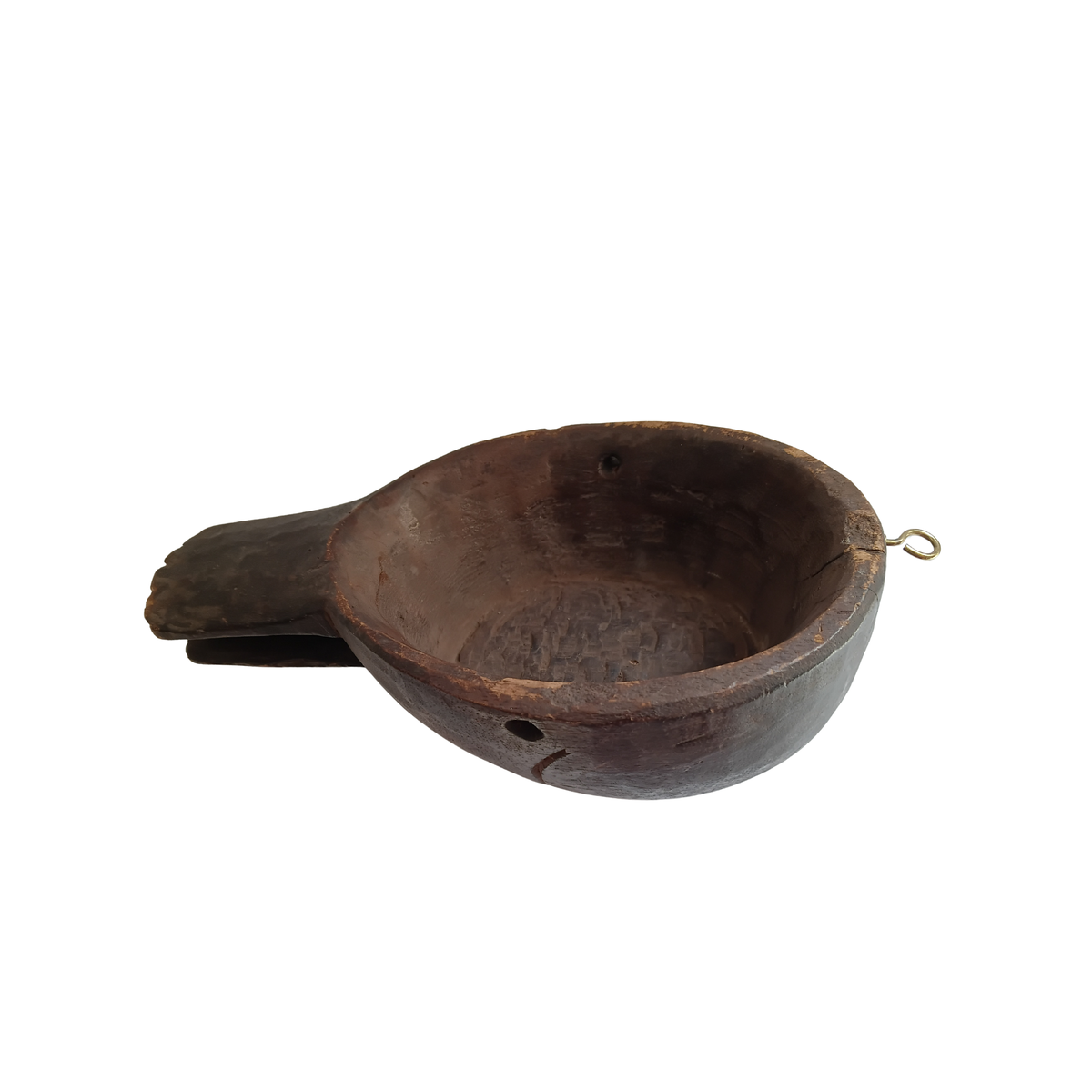 A rustic dark brown wooden spoon with a handle and a small metal ring at the top, shown on a plain white background.