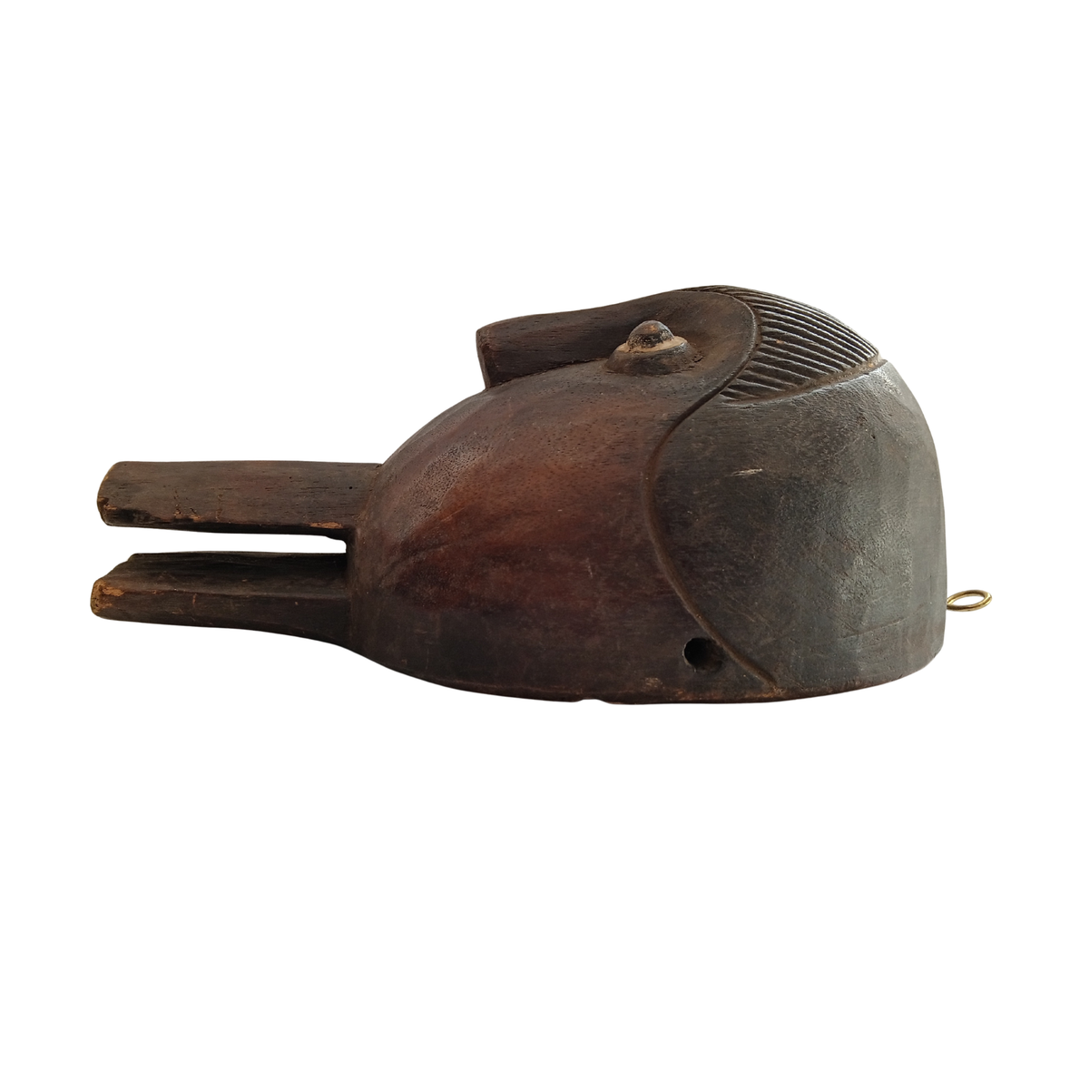 A hand-carved dark brown wooden spoon, shown against a plain white background.