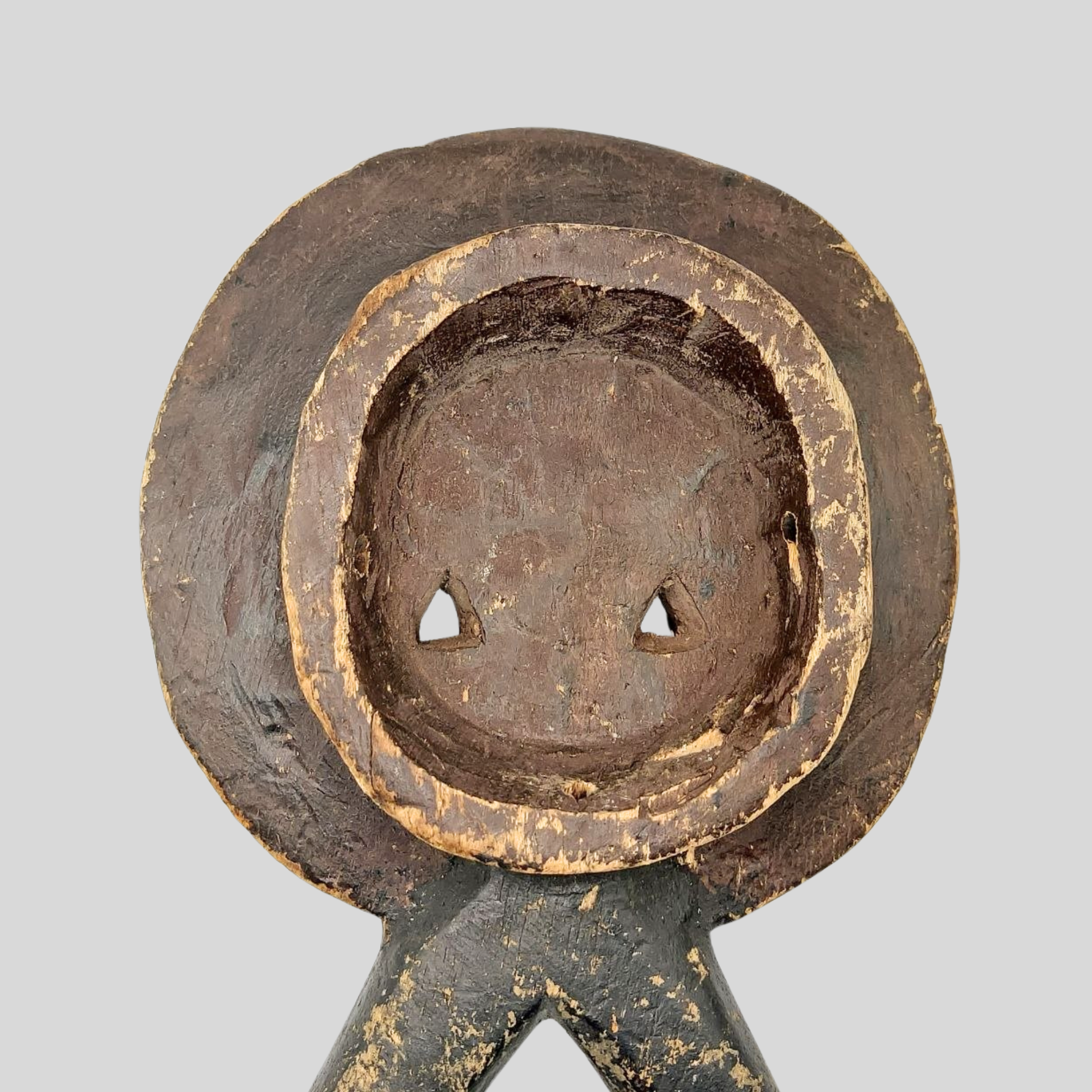 Close-up of the back of an African wooden mask