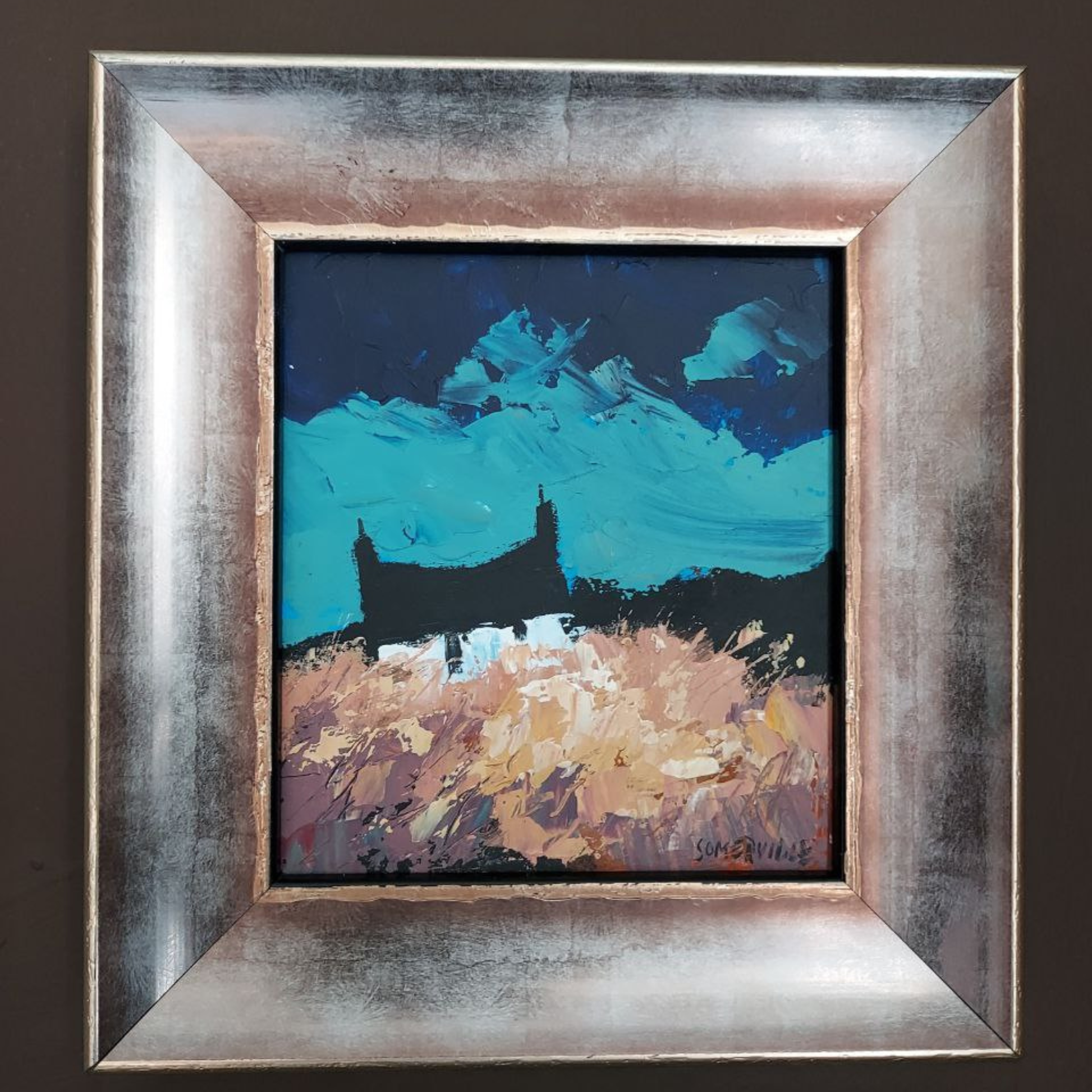 Framed George Somerville painting with blue and brown tones on a dark background
