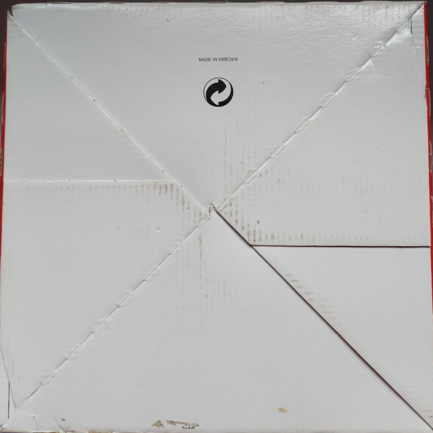 The bottom of a white box with "Made in Sweden" written on it