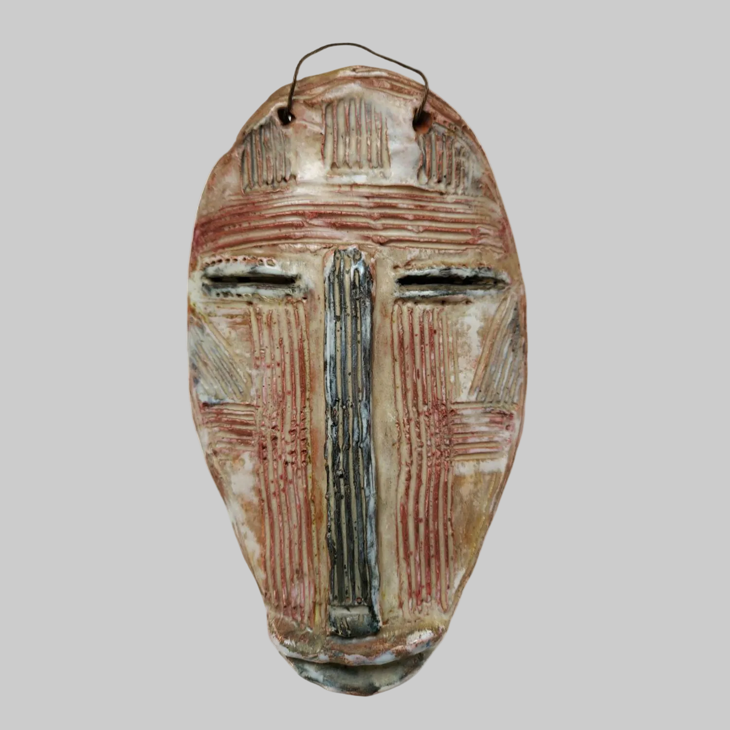 A Mid Century Modern version of a striped African Tribal Mask