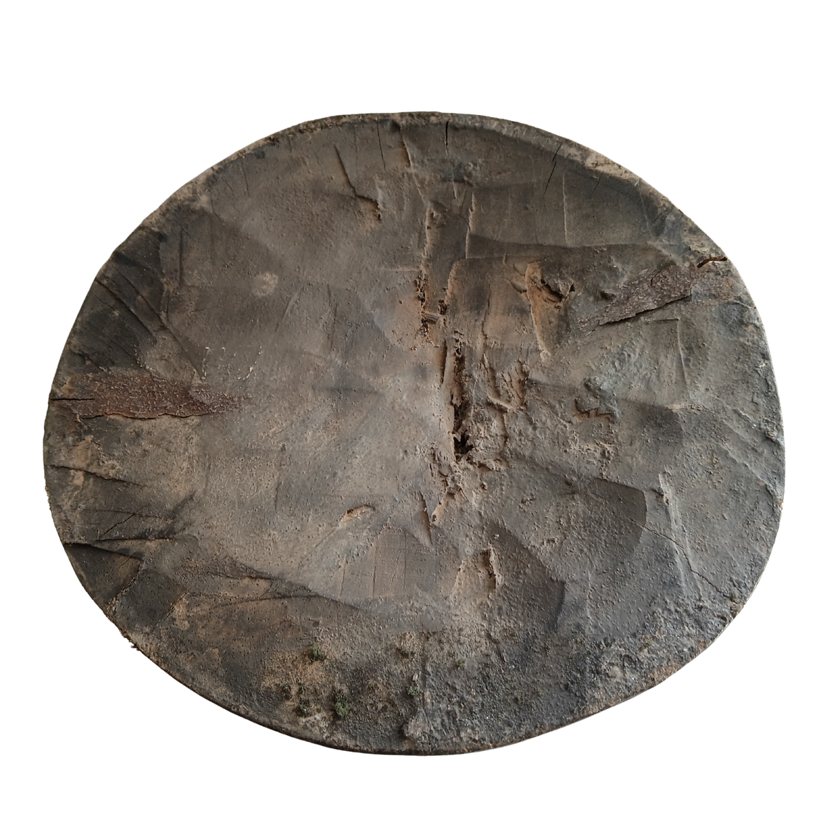 The base of a wooden stool with natural texture, cracks, and weathered markings, shown against a plain white background.