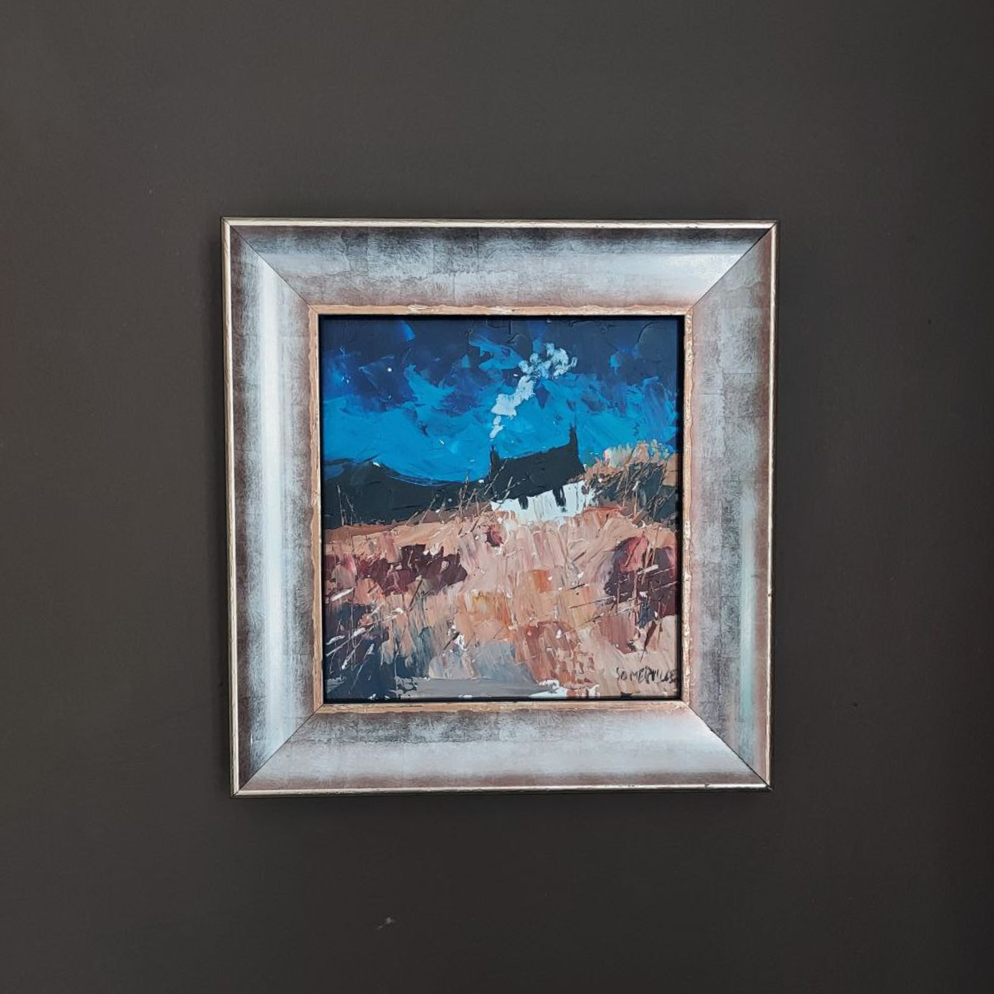 George Somerville Painting on a dark wall. 