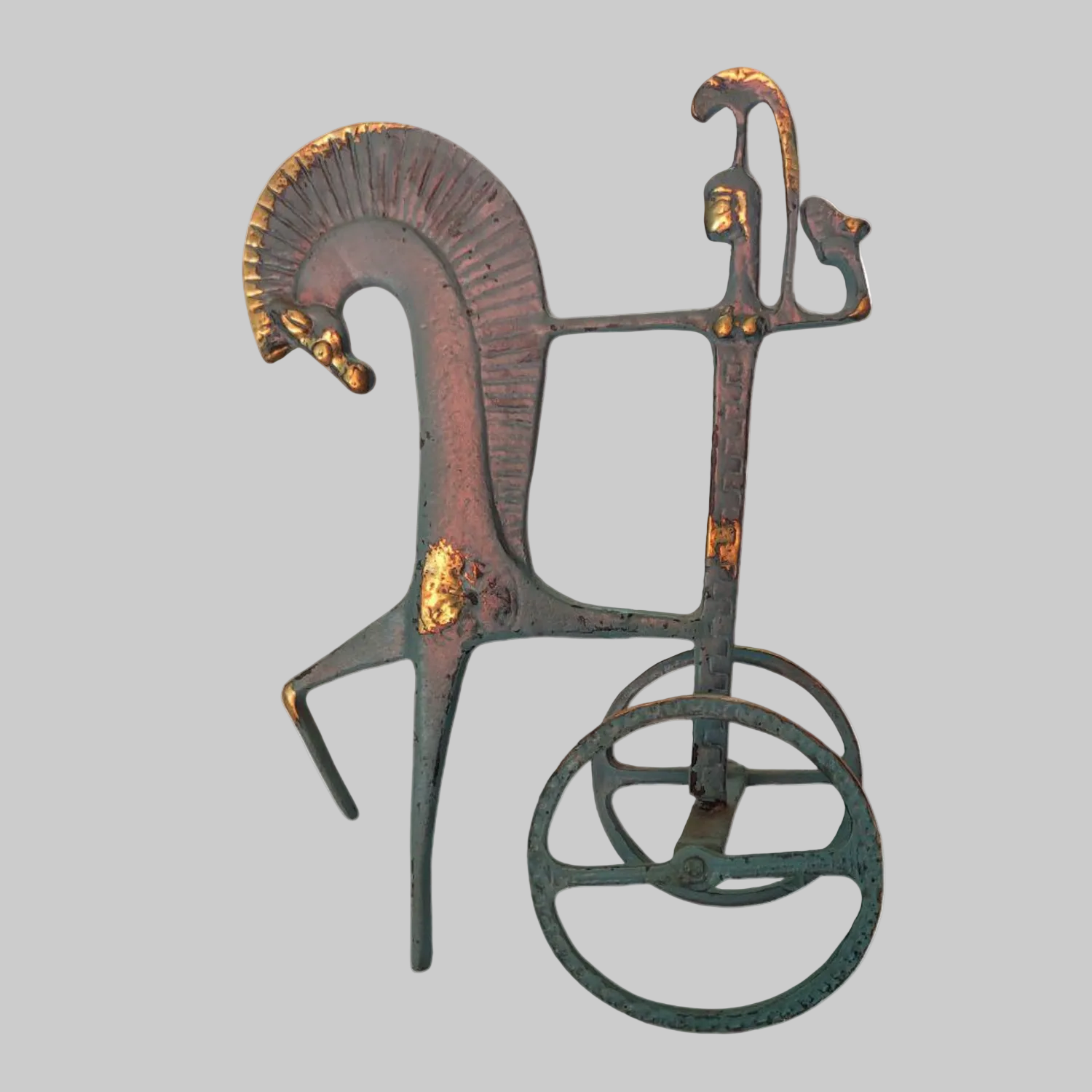 Decorative metal sculpture of a horse on a white background