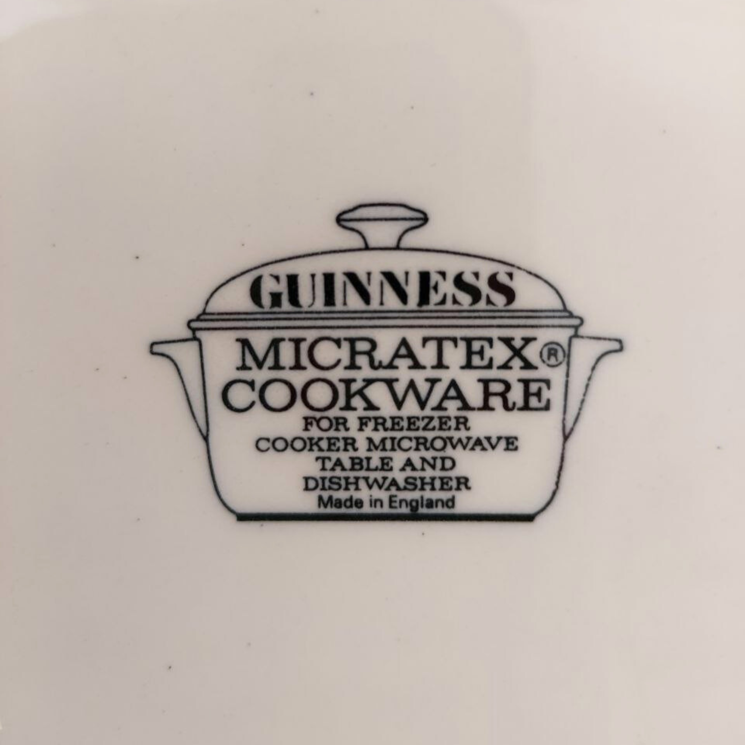 Guinness Micratex cookware logo on a white background