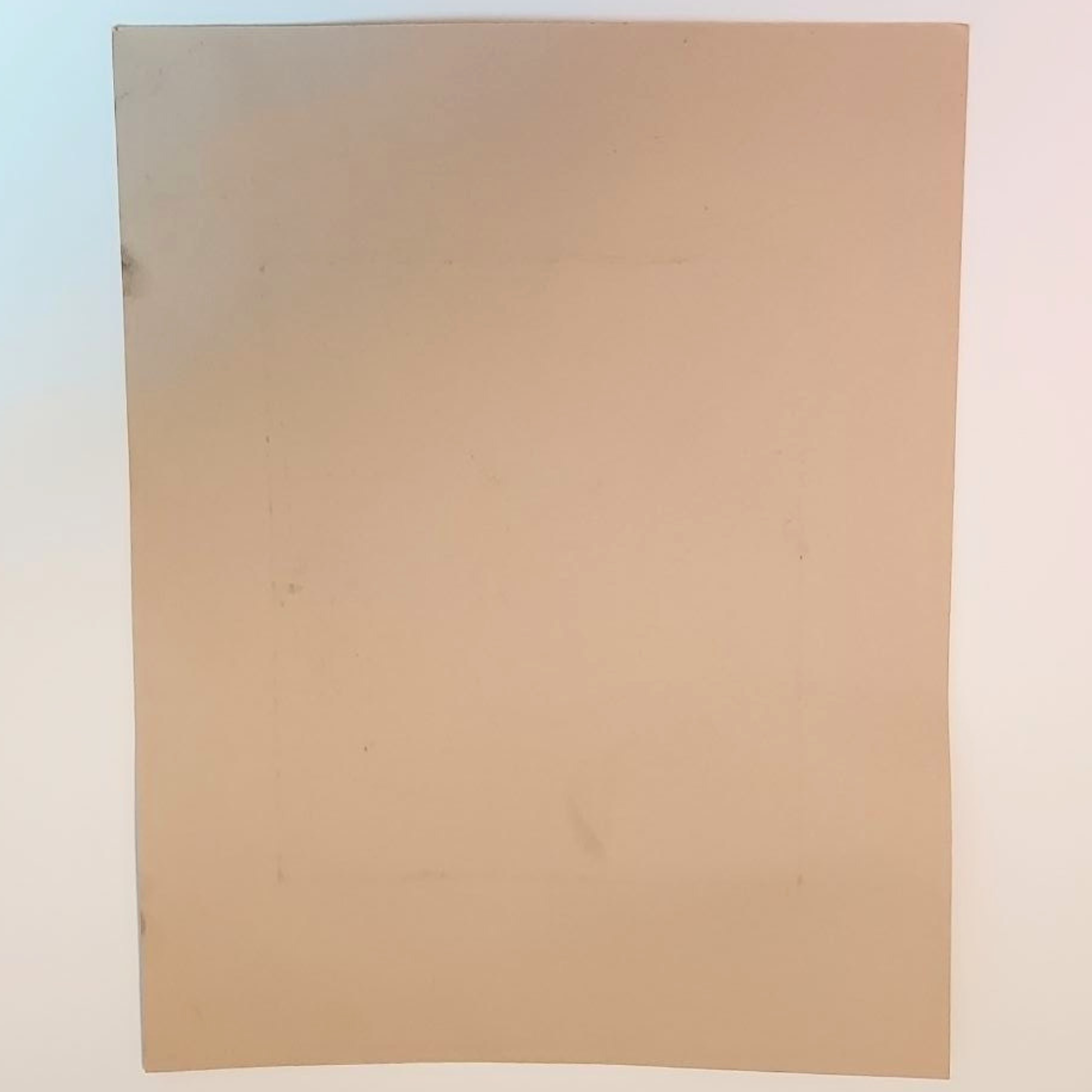 The back of an etching, which is blank card. 