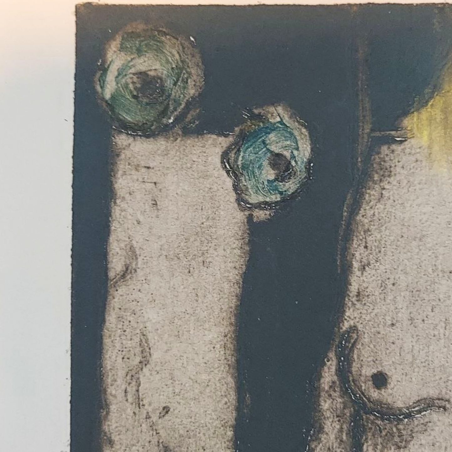 Abstract artwork with green and black elements on a textured surface