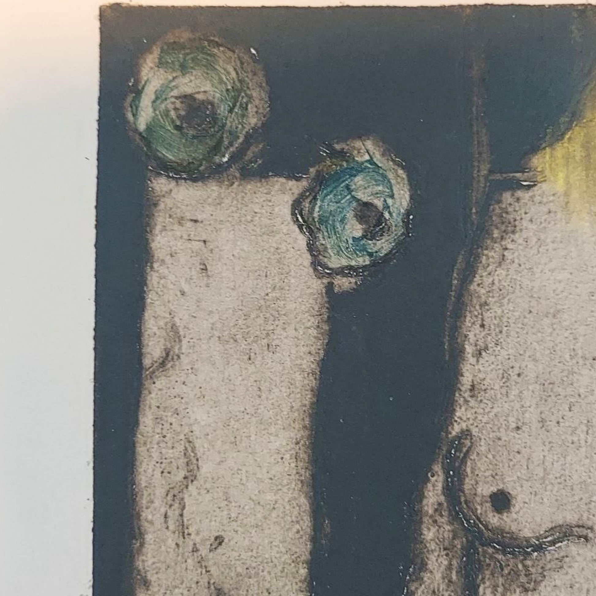 Abstract artwork with green and black elements on a textured surface