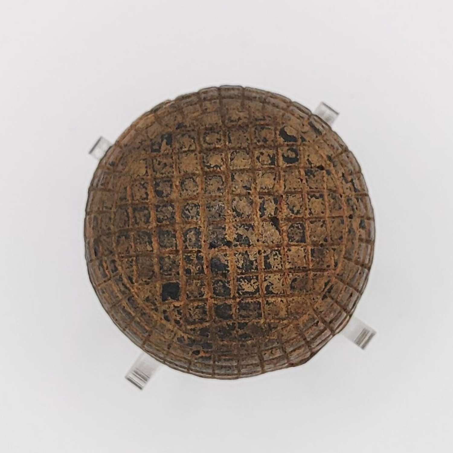 Top view of a vintage golf ball on a white background. 