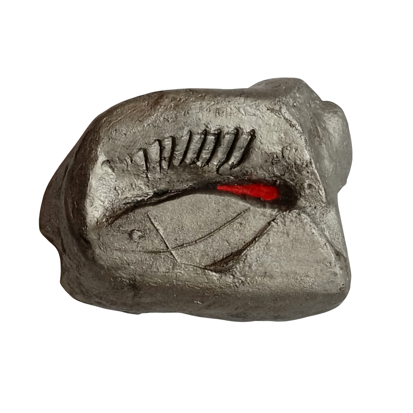 Metallic sculpture with a textured surface and red interior on a white background