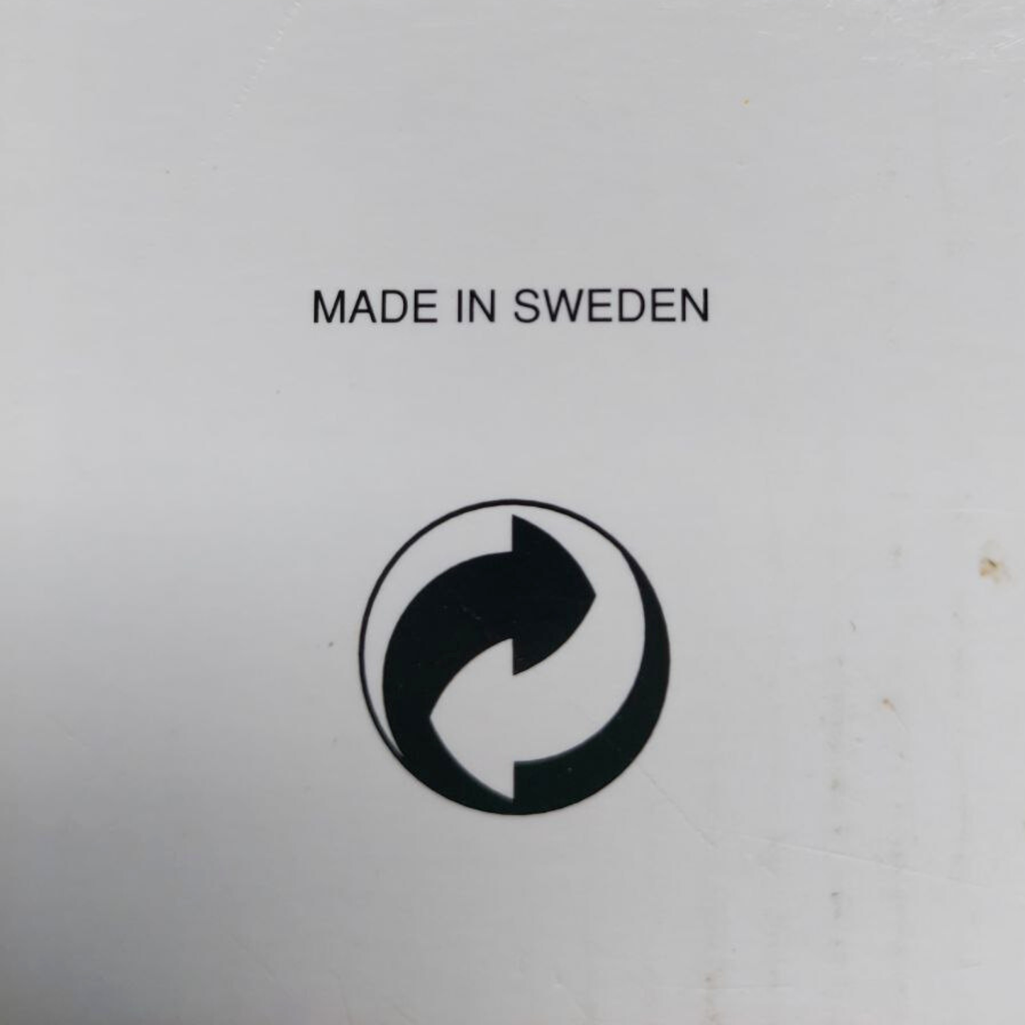 Logo with 'Made in Sweden' text on a light grey background