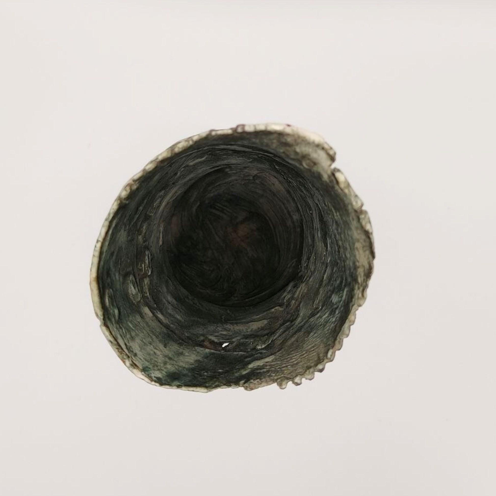 A top down view of a vintage Pam Schomberg vase