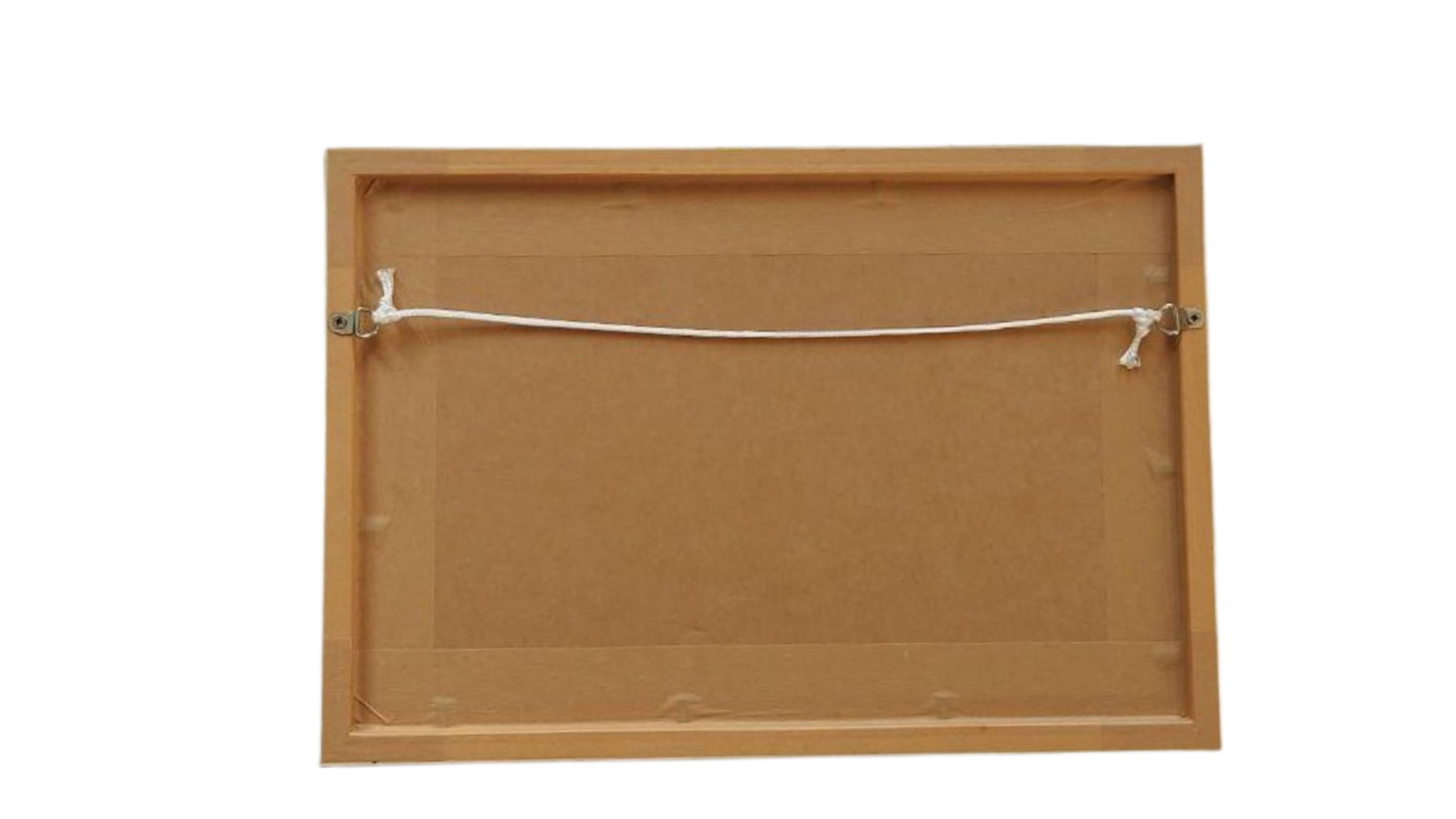 Wooden picture frame with a white string on a white background
