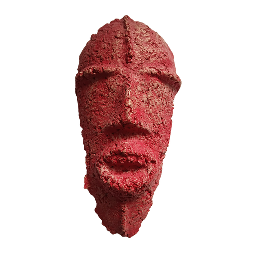 A textured red sculptural mask of a man, isolated on a solid white background.