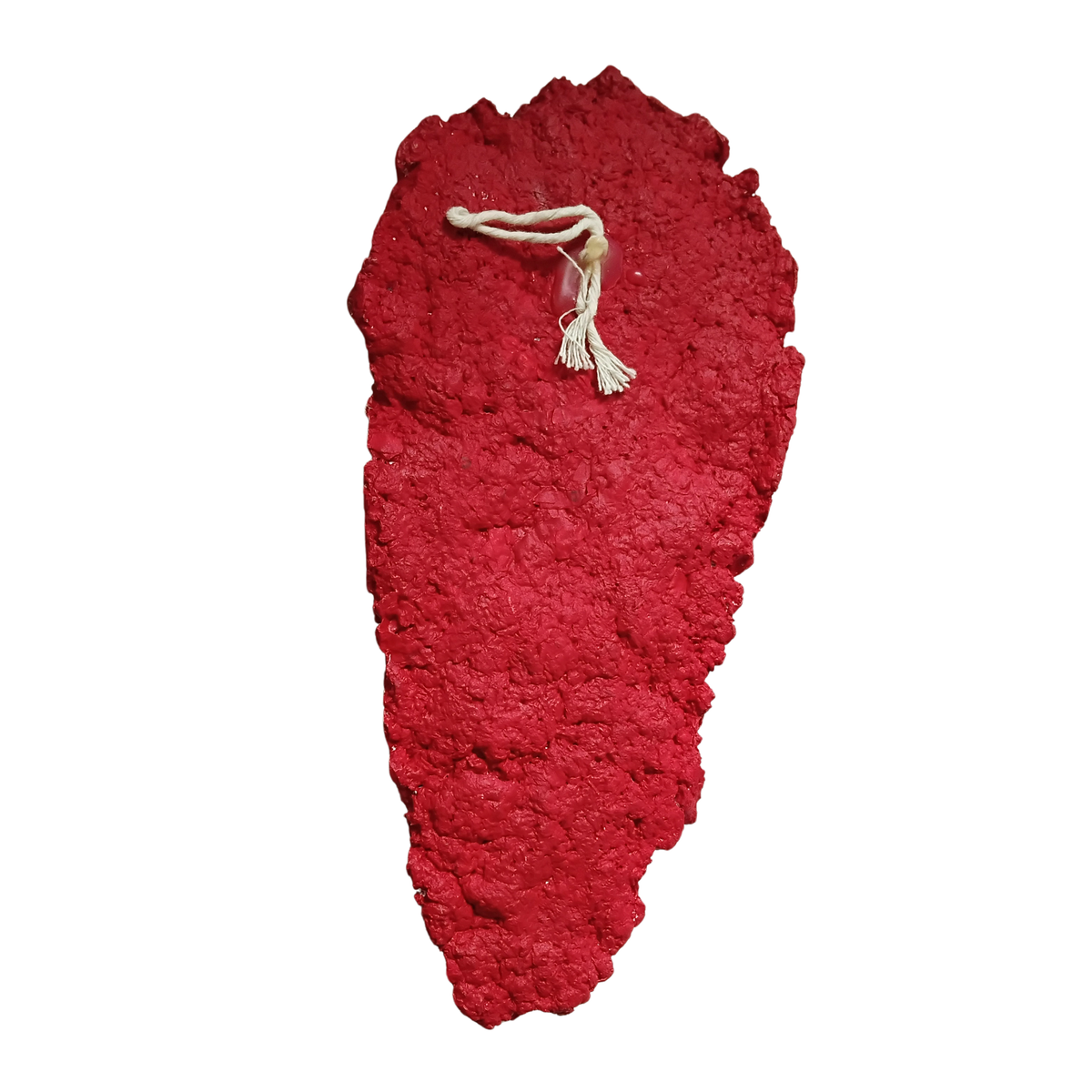 A textured red decorative wall mask with an irregular organic shape and a small white tassel cord at the top, shown on a plain white background.