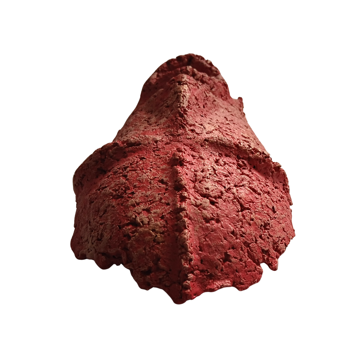 A textured red composite sculpture resembling a stylised man's head, isolated on a solid white background.