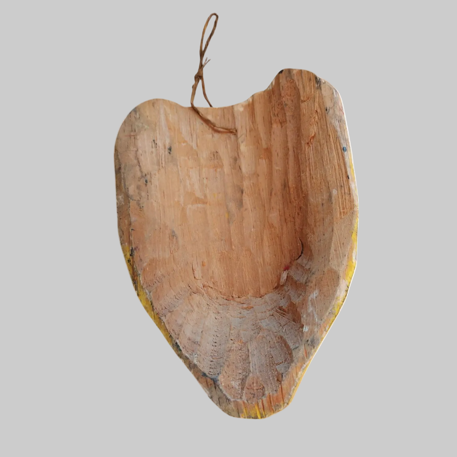 The back of a wooden vintage Mexican tiger mask