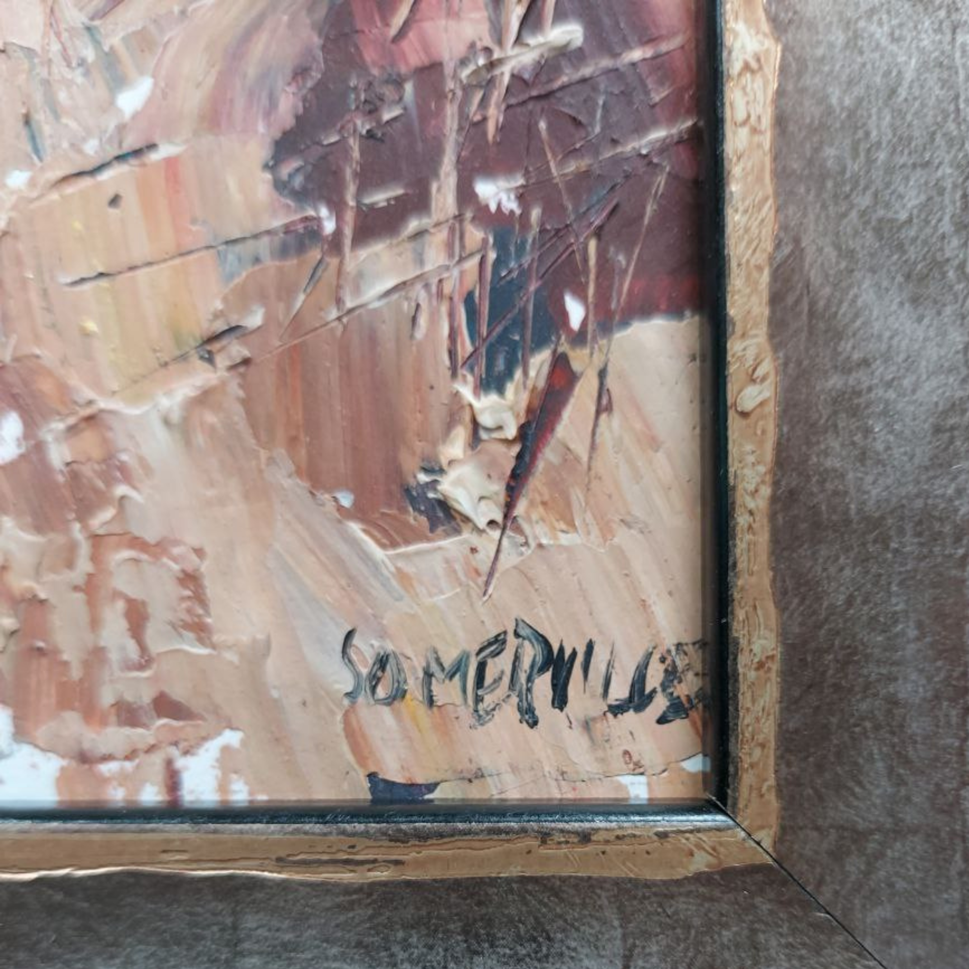 Painting with 'Somerville' signature in a wooden frame.