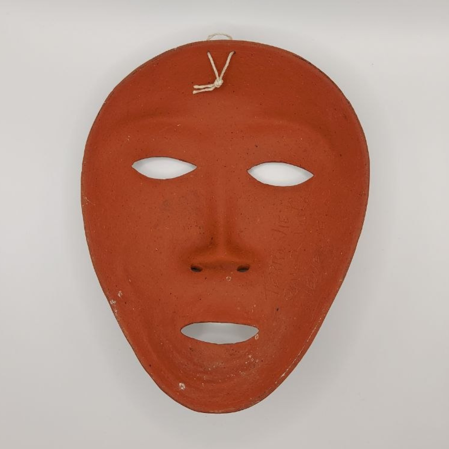 Red mask on a white background