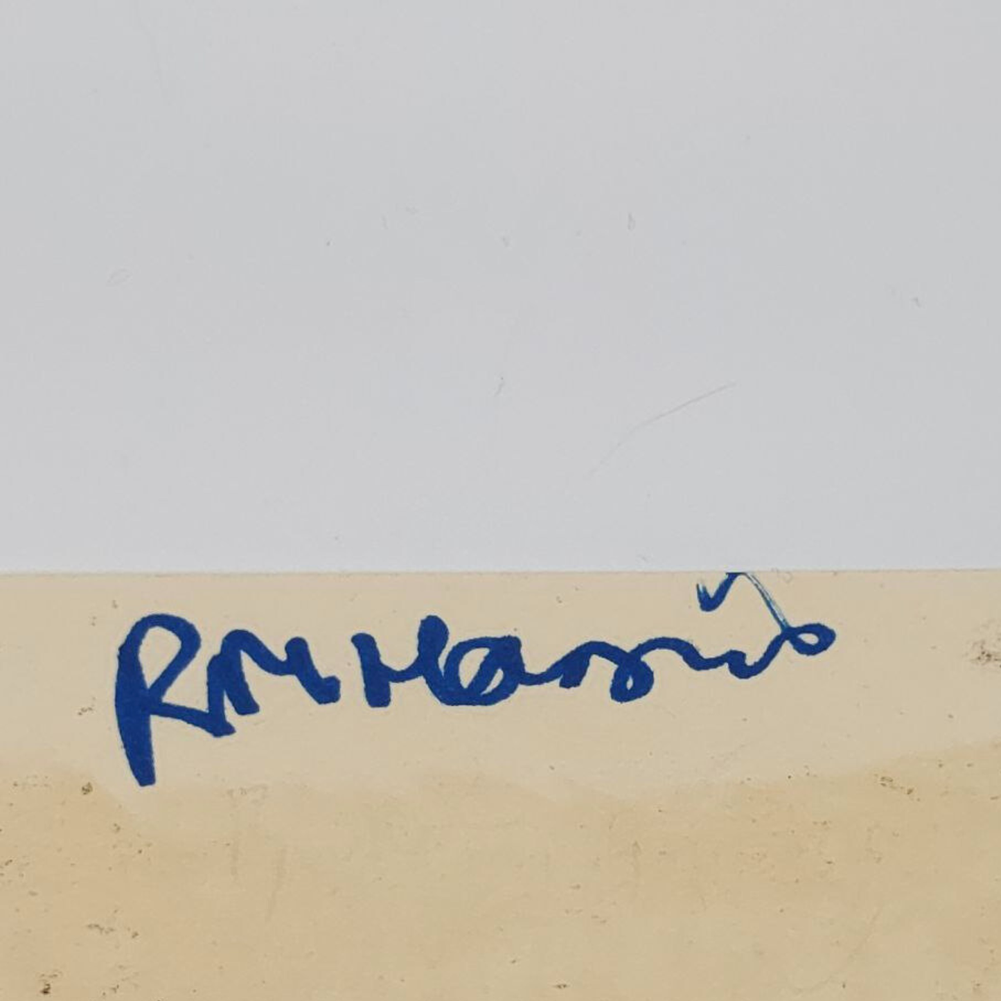 Blue RM Harris signature on a beige and grey background