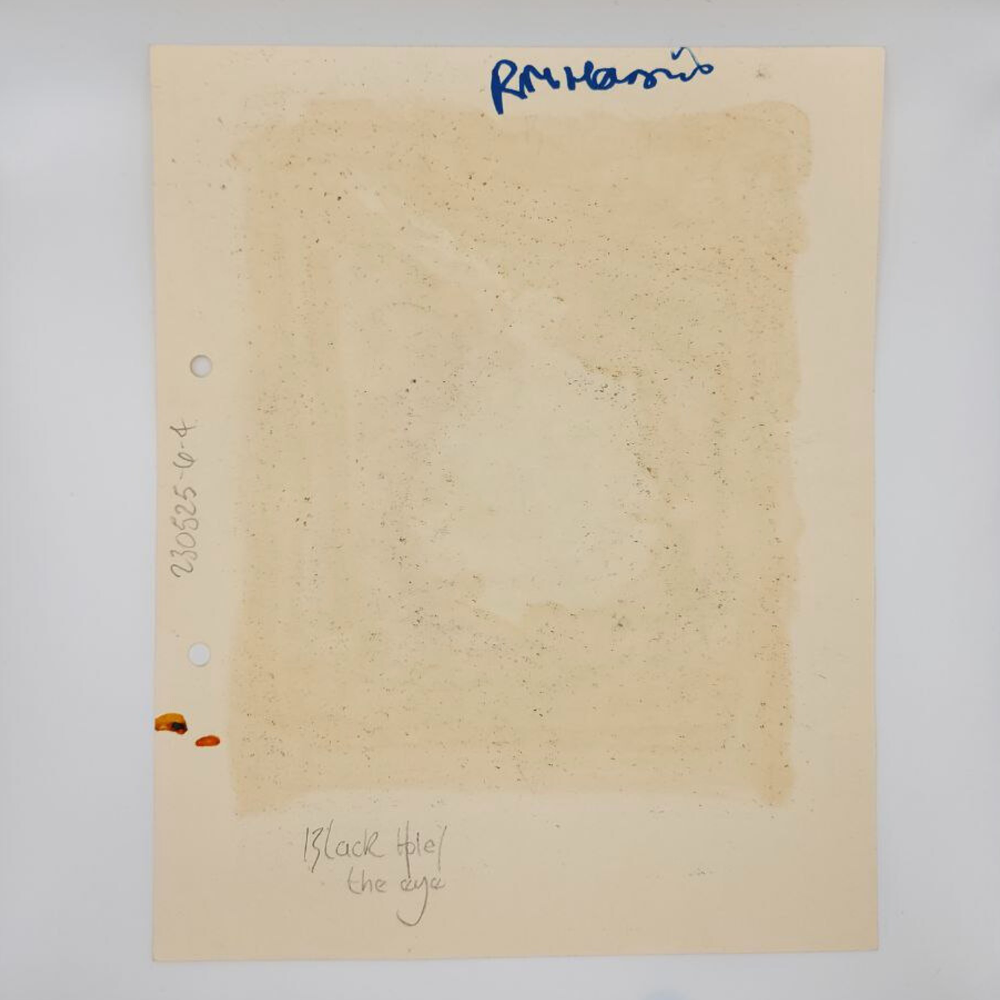 Beige paper with RM Harris signature on a white background