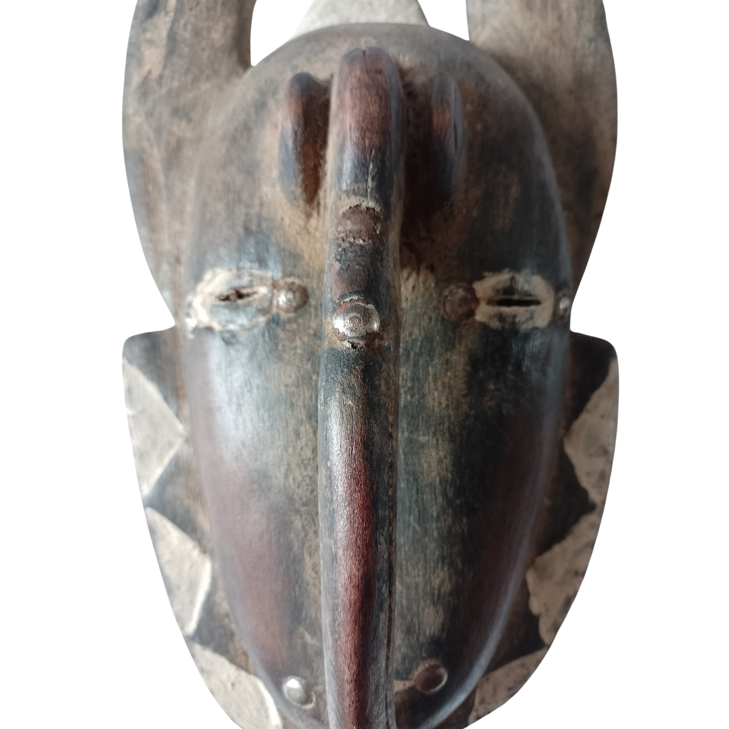 Wooden mask with a dark brown finish on a white background