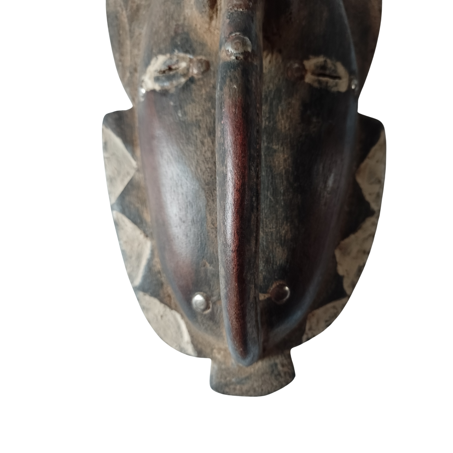 Wooden mask with a worn texture on a white background