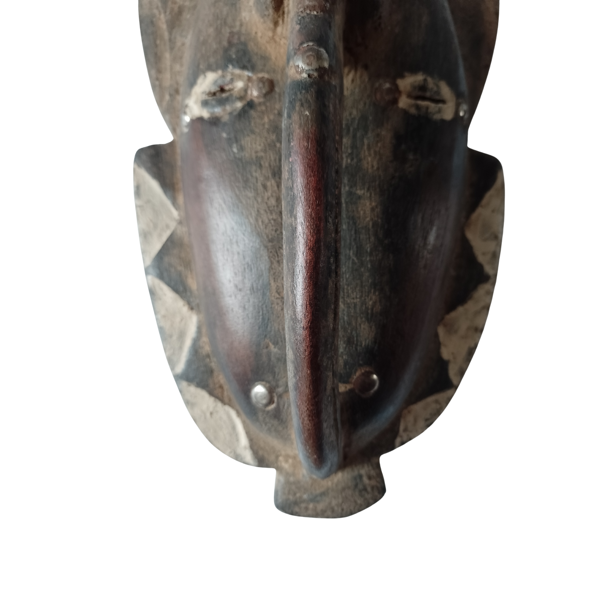 Wooden mask with a worn texture on a white background